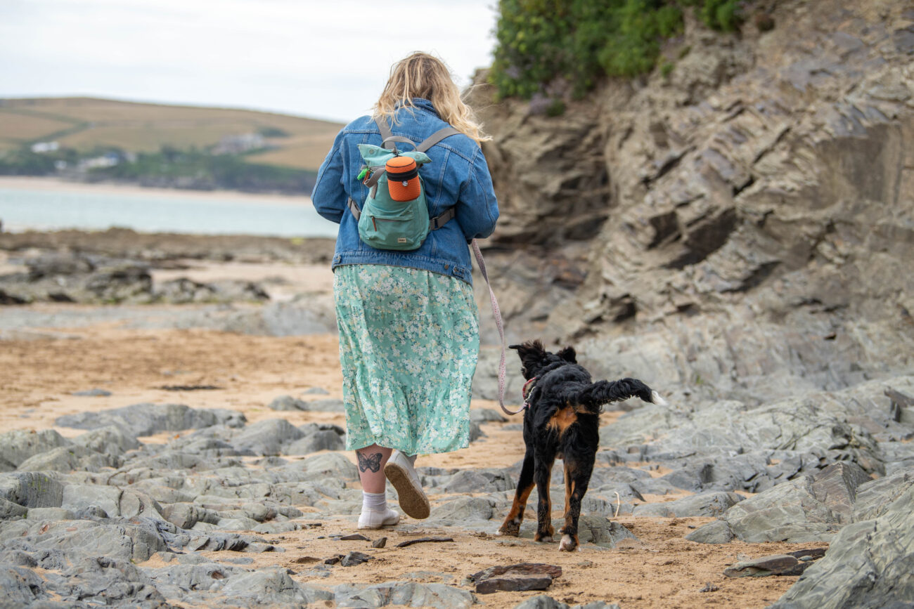 Photoshoot showing Dicky Bags in use on a Cornwall beach where there aren't many bins.